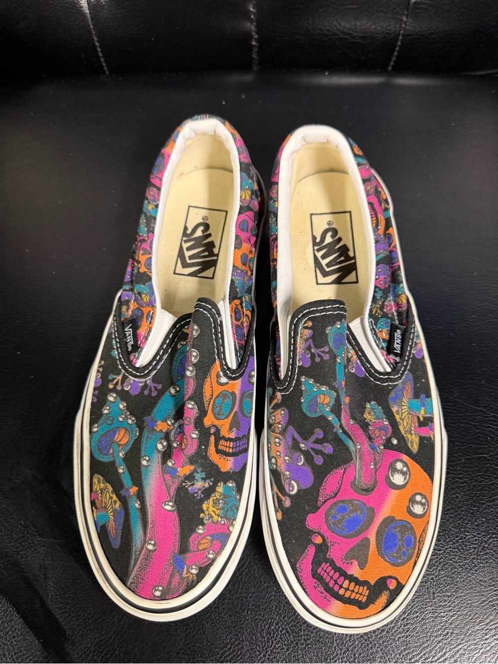 Vans Black Slip-On Sneakers with Neon Skull Print